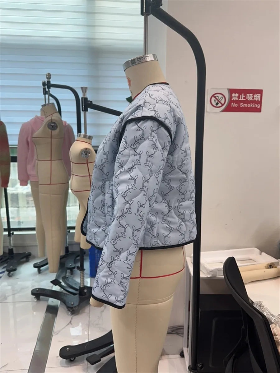 BloomGuard Floral Puffer Button Jacket
