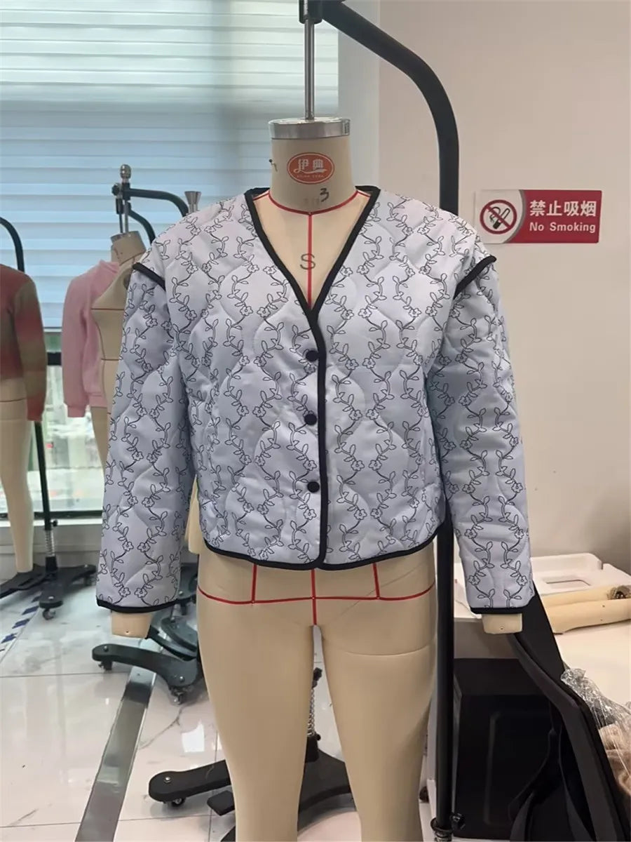 BloomGuard Floral Puffer Button Jacket