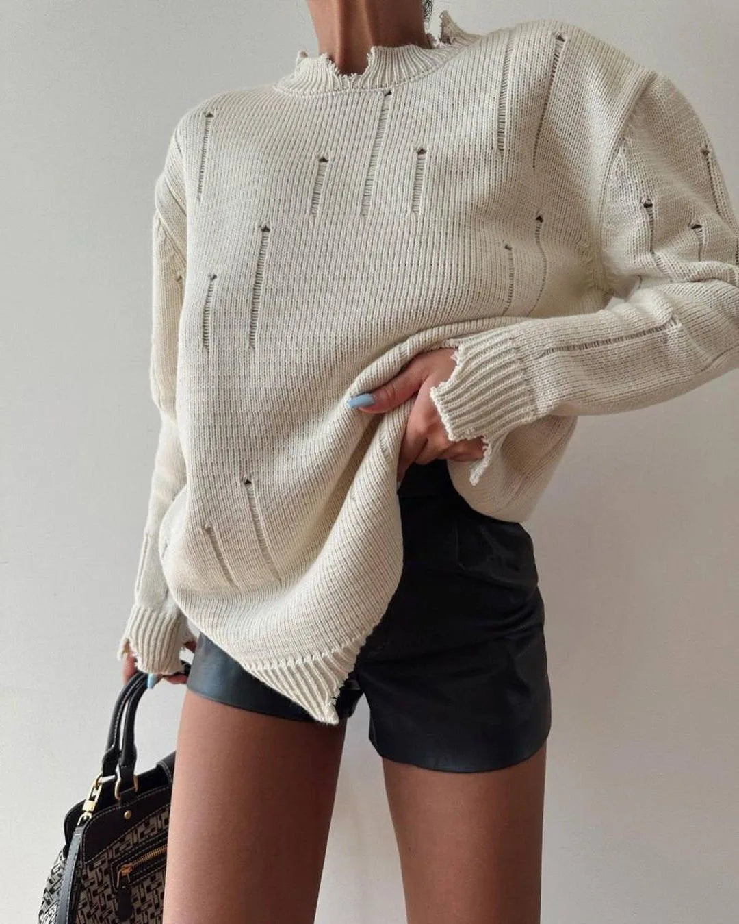 Urban Chic Black Hole Knit Sweater