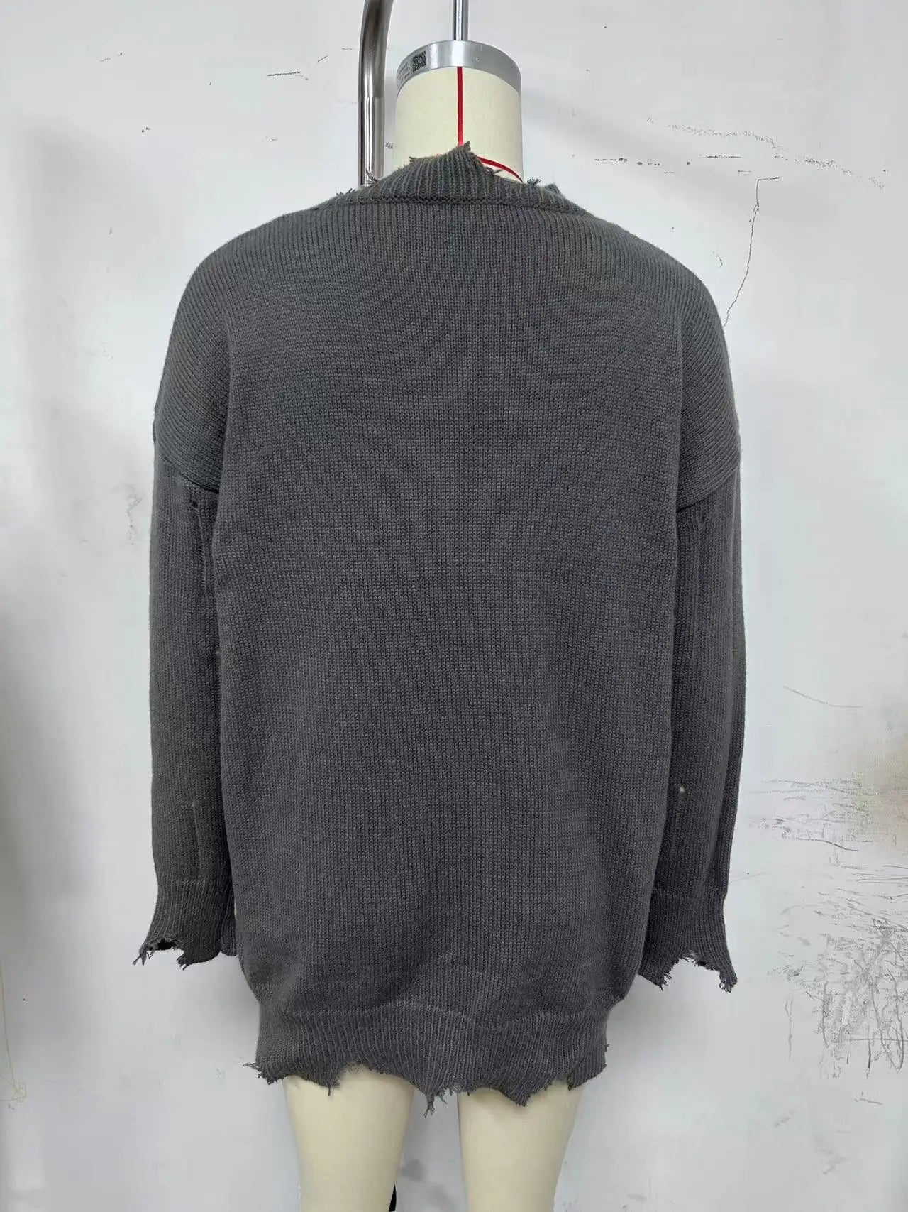 Urban Chic Black Hole Knit Sweater